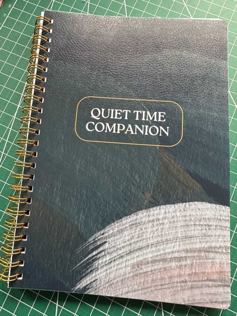 Finished HEARTPRINTS hard-bound journal with a dark green and blush abstract cover titled Quiet Time Companion