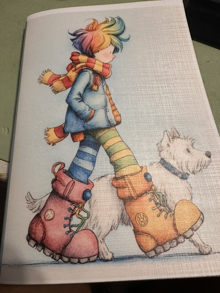 Finished HEARTPRINTS preschool notebook with a rainbow-haired child and dog illustration